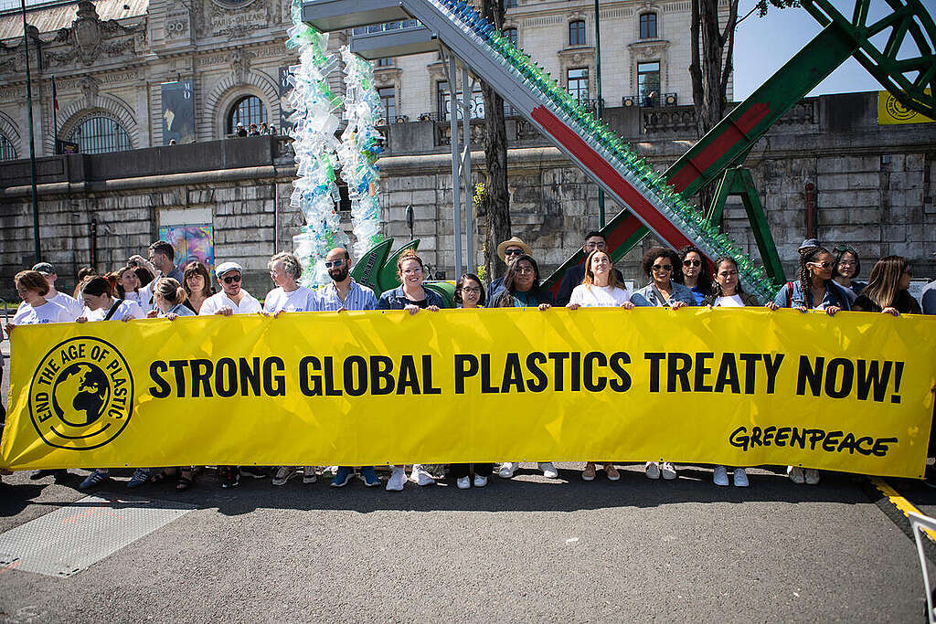 Greenpeace International together with artist and activist Benjamin Von Wong unveil a 5-metre tall art installation called the #PerpetualPlastic Machine on the banks of the Seine River on Saturday, May 27, 2023 to present a clear message: the Global Plastics Treaty must stop runaway plastic production and use. © Noemie Coissac / Greenpeace