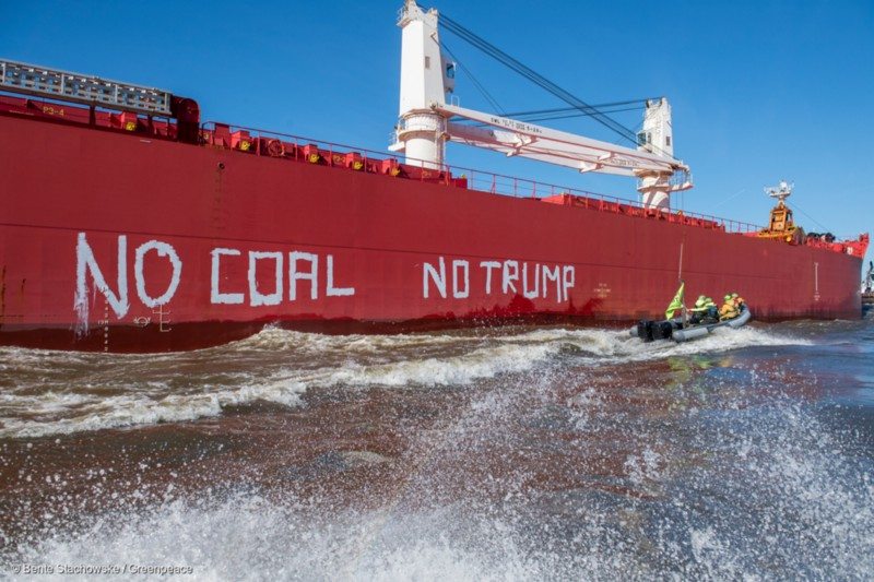 Greenpeace protest against the ship SBI Subaru filled with 60,000 tons of US hardcoal headed from Texas to Hamburg. Just a few hours before Trump informs the world what role the US will play in the Paris agreement there were dinghys on the river Elbe, swimmers in the water with banners reading “resist” ,”no coal” and “no Trump” and the same writing on the vessle’s side, sending a clear message to the fossil fuels industry