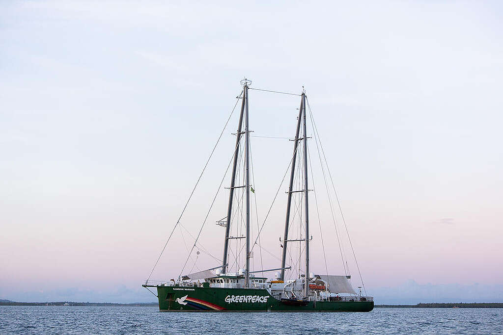 The iconic Greenpeace ship Rainbow Warrior anchors near Bohol to surface the stories of communities in islands struggling with sea-level rise, a symptom of the climate crisis largely fuelled by oil and gas companies. © Geric Cruz / Greenpeace