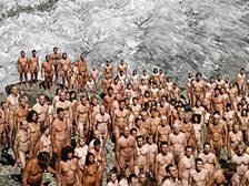 Living sculpture: hundreds of naked volunteers express the vulnerability of glaciers and human life in a warming world.