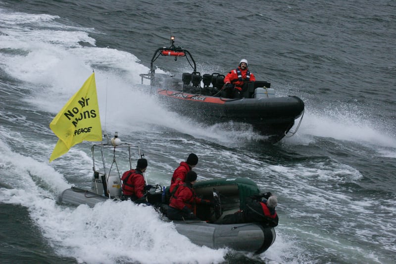Greenpeace activists blockade the trident nuclear submarine base at Faslane, Scotland (2007).
