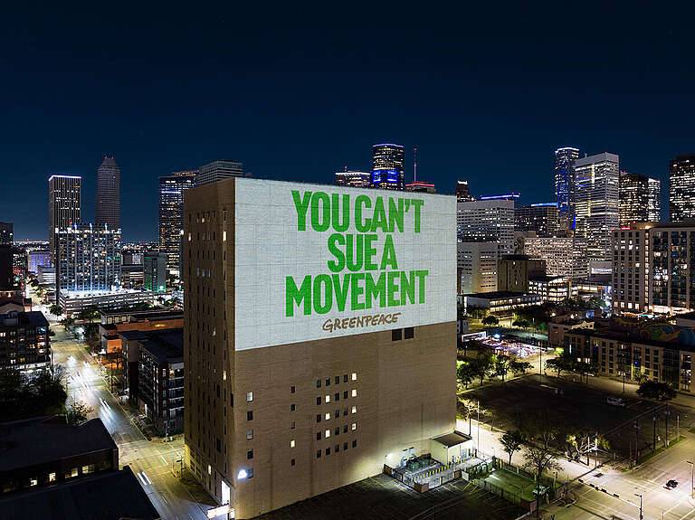 SLAPP 'We Will Not Be Silenced' Projections in Houston. © Greenpeace