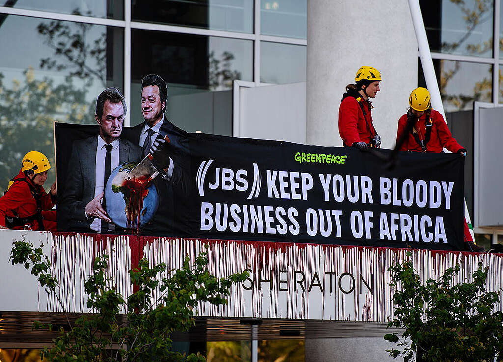 Activists Disrupt JBS Shareholders’ Meeting in Amsterdam. © Marten  van Dijl / Greenpeace