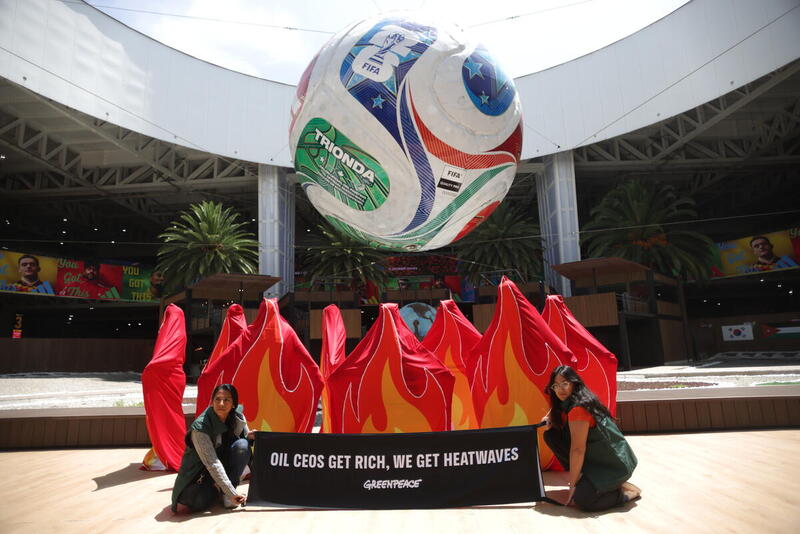Greenpeace Mexico activists stage a peaceful protest at Terminal 2 of Mexico City International Airport.